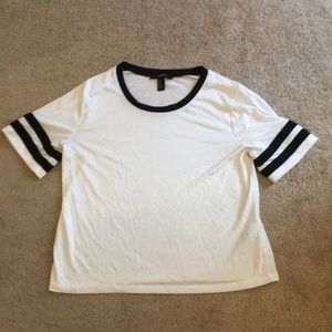 white and black short sleeve shirt